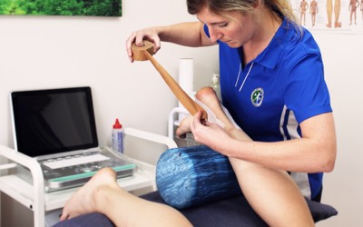 Demonstration of physiotherapy treatment called strapping